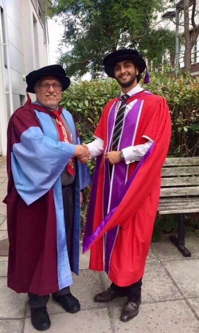 Mohammed Alhusban at his PhD graduation ceremony at the University of Portsmouth in 2015, with his supervisor, Dr Carl Adams. Photo: Mohammed Alhusban