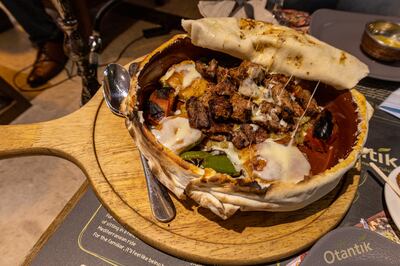 Princess kebab at Cafe Otantik is a diverse dish of meats served over mashed aubergine alongside chargrilled peppers and buttery bread covered in cheese
