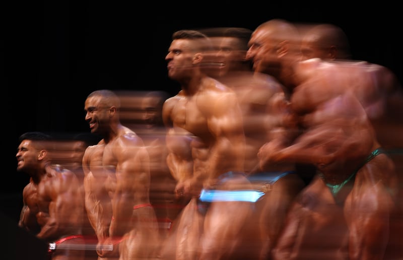 Competitors pose during the Melbourne Bodybuilding Championships at the Kingston Art Centre. Getty Images