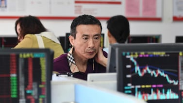 Knowing how to keep our emotions in check while trading is essential. AFP