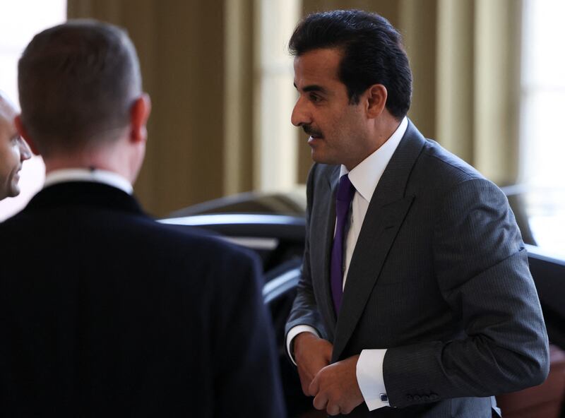Emir of Qatar Sheikh Tamim arrives at the reception. Reuters