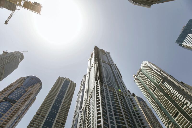 DUBAI, UNITED ARAB EMIRATES - AUG 4: 

Debris surrounding Dubai Marina's Torch Tower, one of the world's tallest residential buildings, after a fire started last night.


(Photo by Reem Mohammed/The National)

Section: NA