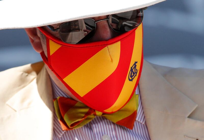 An MCC member wearing a protective face mask at Lord's. Reuters
