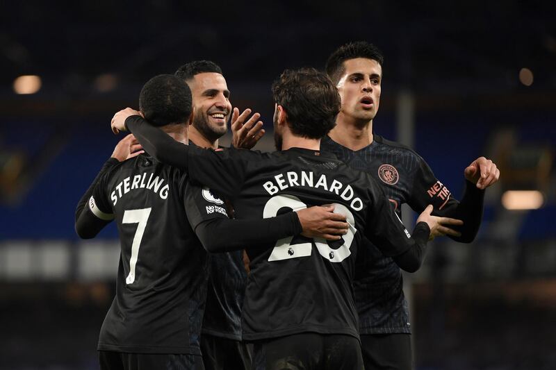 Bernardo Silva, third left, celebrates the third. AP