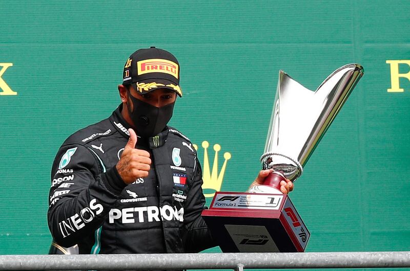 Lewis Hamilton of Britain, center, celebrates after winning the Belgian Grand Prix on Sunday, August 30. AP