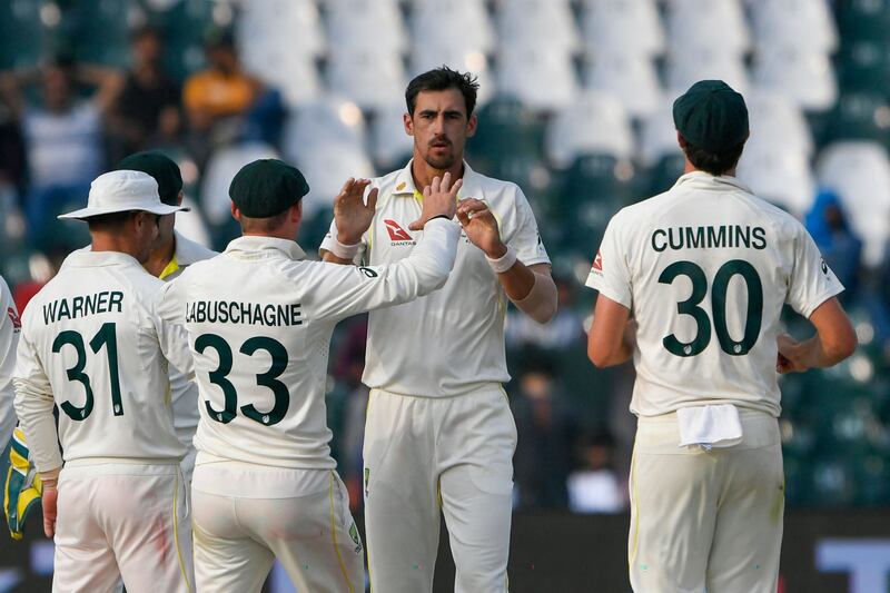 Australia's Mitchell Starc, centre, celebrates after dismissing Pakistan's Mohammad Rizwan in Lahore on Wednesday. AFP