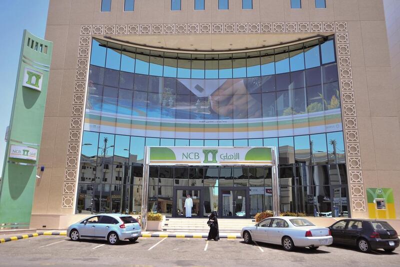 Sarah Al Suhaimi will head the kingdom’s largest asset manager. Above, a National Commercial Bank branch in Jeddah. Michael Bou-Nacklie for The National