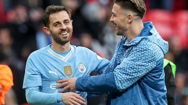 Bernardo Silva (L) and Jack Grealish (R) of Manchester City celebrate after winning the FA Cup semi-final soccer match of Manchester City against Chelsea FC, in London, Britain, 20 April 2024.   EPA/NEIL HALL EDITORIAL USE ONLY.  No use with unauthorized audio, video, data, fixture lists, club/league logos, 'live' services or NFTs.  Online in-match use limited to 120 images, no video emulation.  No use in betting, games or single club/league/player publications. 