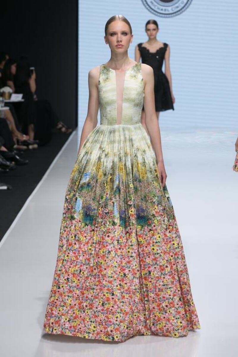 Tea dresses resembled Impressionist paintings of summer meadows with accents of buttercup yellow, cornflower blue and amaranth. Courtesy Michael Cinco and Couturissimo