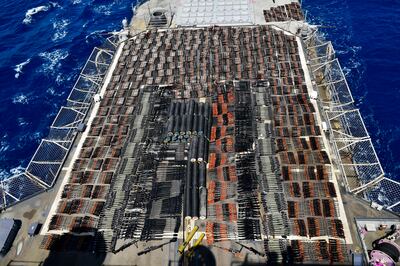 Weapons that the US Navy described as coming from a hidden arms shipment aboard a stateless dhow are seen aboard the guided-missile cruiser 'USS Monterey' on May 8, 2021.  AP