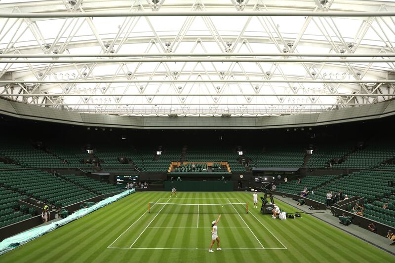 Iga Swiatek trains on Centre Court. Getty