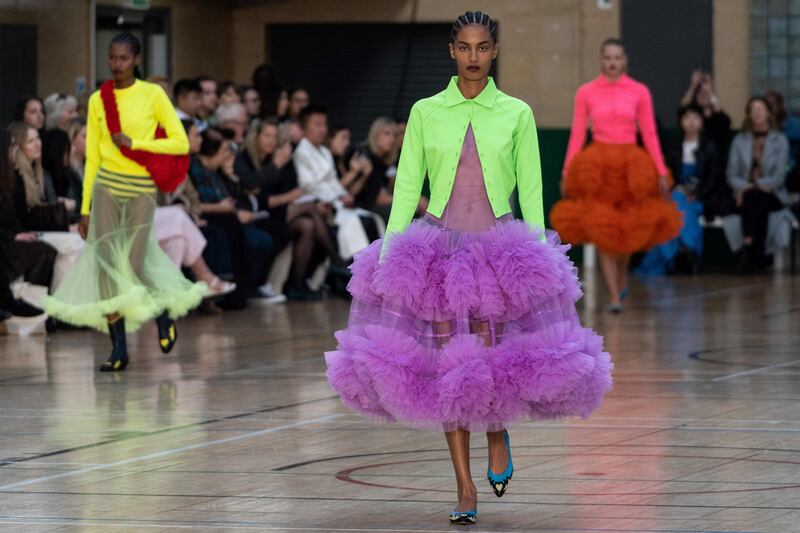 Huge skirts mixed with cropped jackets at the Molly Goddard show. AFP