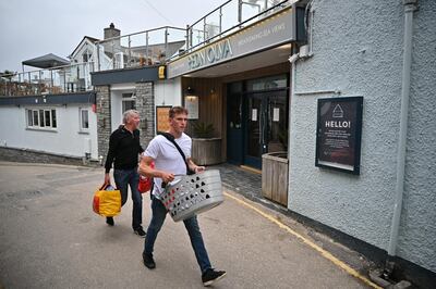 People walk past the Pedn Olva hotel in St Ives. Getty Images