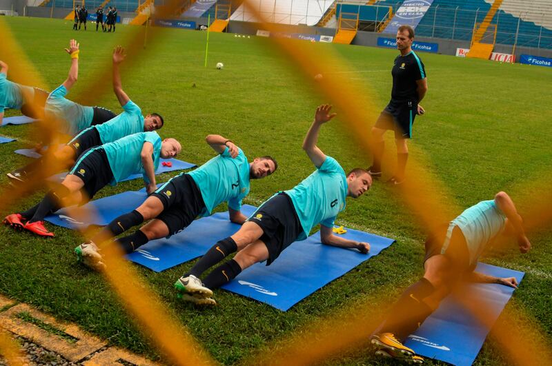 Australian players (L to R) Tim Cahill, Aaron Mooy, Milos Degenek and Dylan McGowan exercise during a training session at Francisco Morazan stadium in San Pedro Sula, 180 kilometres north of Tegucigalpa on November 7, 2017, ahead of the upcoming first leg football match of their 2018 World Cup qualifying play-off against Honduras next November 10.  / AFP PHOTO / ORLANDO SIERRA
