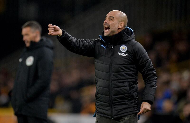 epa08092154 Manchester City's manager Pep Guardiola reacts during the English Premier league soccer match between Wolverhampton Wanderers and Manchester City held at the Molineux stadium in Wolverhampton, Britain, 27 December 2019.  EPA/PETER POWELL EDITORIAL USE ONLY. No use with unauthorized audio, video, data, fixture lists, club/league logos or 'live' services. Online in-match use limited to 120 images, no video emulation. No use in betting, games or single club/league/player publications