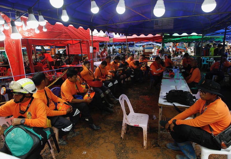Thai Civilian Defense Volunteers prepare to join the "D-Day." EPA