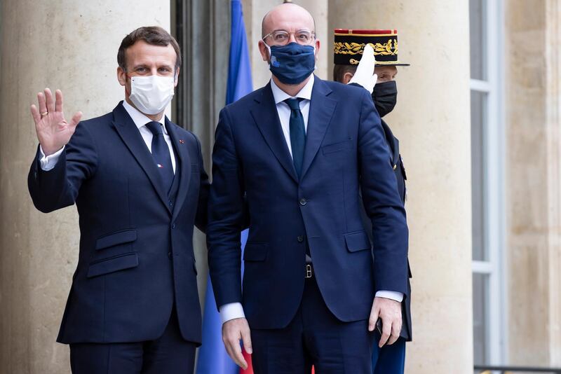 Macron greets European Council President Charles Michel in Paris on 14 December. EPA