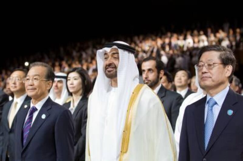 ABU DHABI, UNITED ARAB EMIRATES - January 16, 2012:  From left: HE Wen Jiabao, Premier of China,  HH General Sheikh Mohamed bin Zayed Al Nahyan Crown Prince of Abu Dhabi Deputy Supreme Commander of the UAE Armed Forces, HE Kim Hwang-sik, Prime Minister of South Korea during the opening ceremony of the World Future Energy Summit 2012 at the Abu Dhabi National Exhibition Centre. ( Philip Cheung  / Crown Prince Court - Abu Dhabi )