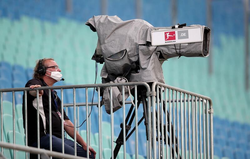 A television camera operator at the match. AFP