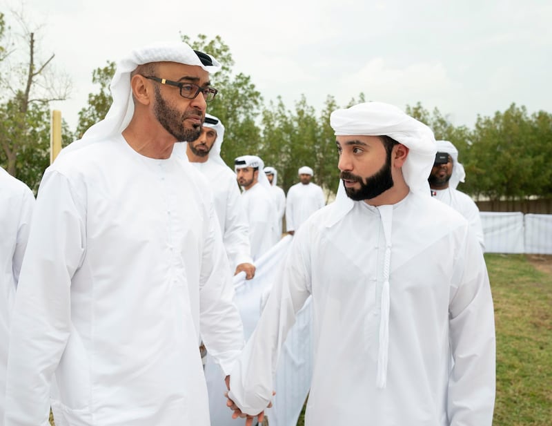 ABU DHABI, UNITED ARAB EMIRATES - November 20, 2019: HH Sheikh Mohamed bin Zayed Al Nahyan, Crown Prince of Abu Dhabi and Deputy Supreme Commander of the UAE Armed Forces (L) and HH Dr Sheikh Hazza bin Sultan bin Zayed Al Nahyan (R), attend the burial of the late HH Sheikh Sultan bin Zayed Al Nahyan, UAE President's Representative.

( Mohamed Al Hammadi / Ministry of Presidential Affairs )
---