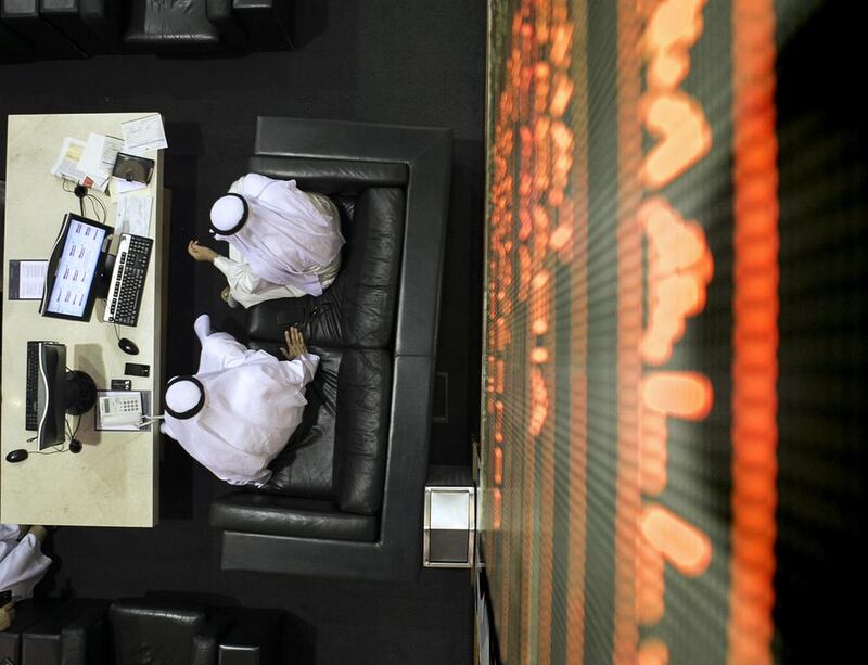 Dubai shares drifted lower in midafternoon trading before recovering at the close. Reem Mohammed / The National