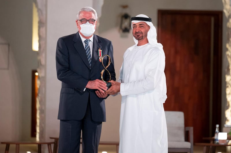ABU DHABI, UNITED ARAB EMIRATES - April 07, 2021: HH Sheikh Mohamed bin Zayed Al Nahyan, Crown Prince of Abu Dhabi and Deputy Supreme Commander of the UAE Armed Forces (R), presents an Abu Dhabi Award to Dr Essam ElShammaa (L), during an awards ceremony, at Qasr Al Hosn.

( Mohamed Al Hammadi / Ministry of Presidential Affairs )
---