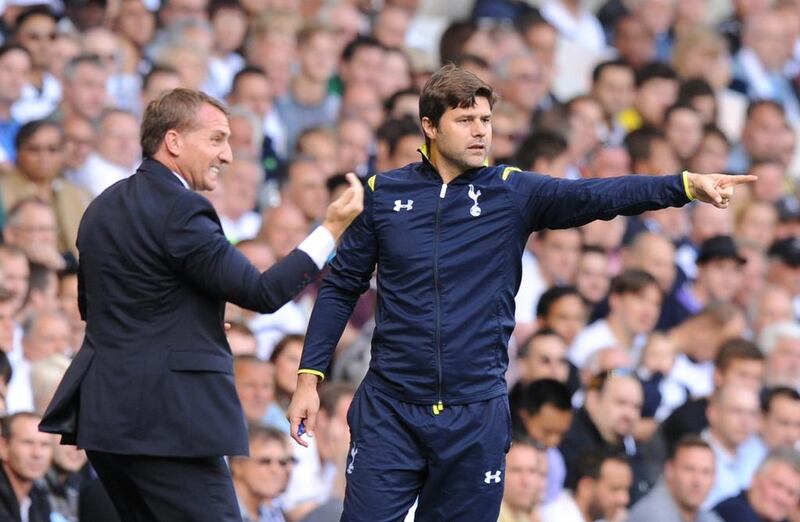 Tottenham Hotspur's Argentinian head coach Mauricio Pochettino, right. Tottenham are the subject of a buy out. Olly Greenwood / AFP