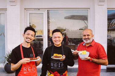Chef Reif Othman, centre, with chef Jun Tomioka, left, and business partner Ahsan Kahlon. Courtesy Reif Japanese Kushiyaki