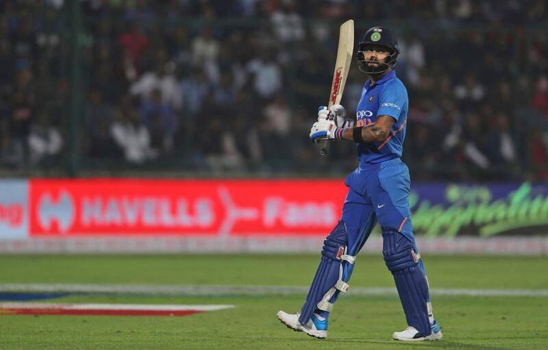 India's captain Virat Kohli walks back to the pavilion after being dismissed during the final one day international cricket match between India and Australia in New Delhi, India, Wednesday, March 13, 2019. (AP Photo/Altaf Qadri)