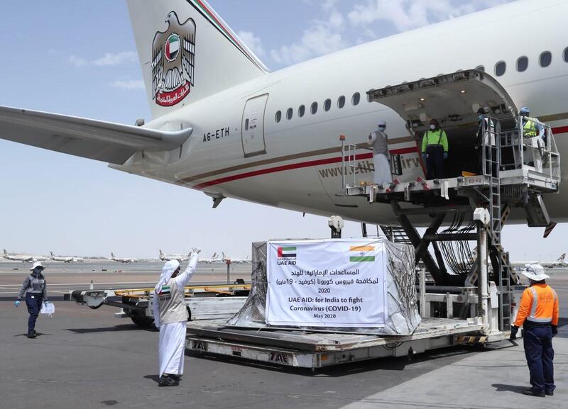 Emirati officials wave off an aid flight heading for India on Saturday. Among the equipment was medical gear for doctors and nurses. Wam