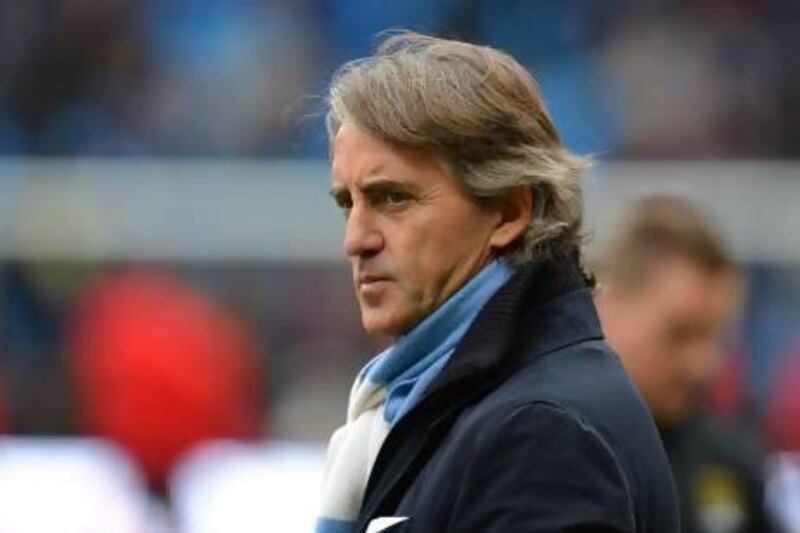 Manchester City's Italian manager Roberto Mancini. ANDREW YATES / AFP