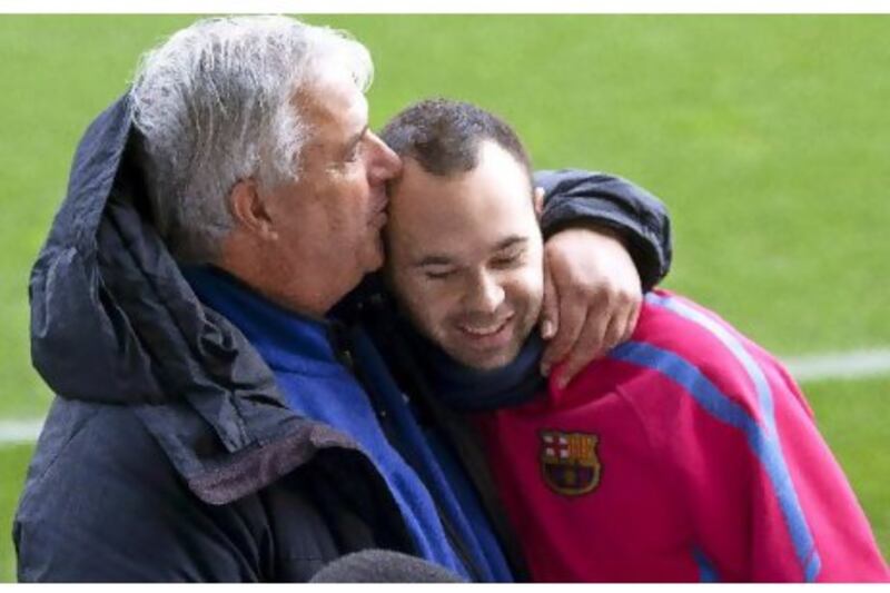 Albert Benaiges, left, has helped procure the talents of Andres Iniesta and Co into world-class footballers at Barcelona.