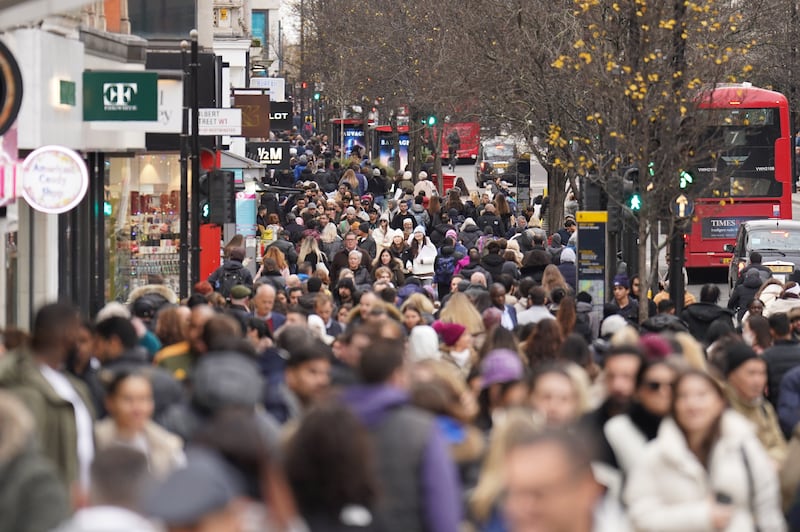 Shoppers on London's Oxford Street. Retail sales volumes fell by 1 per cent in December, the Office for National Statistics said. PA