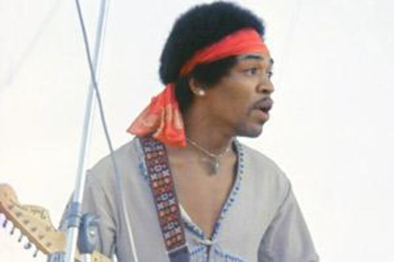 The legendary guitarist Jimi Hendrix on stage at the Woodstock Music and Arts Fair in Bethel, New York in 1969.