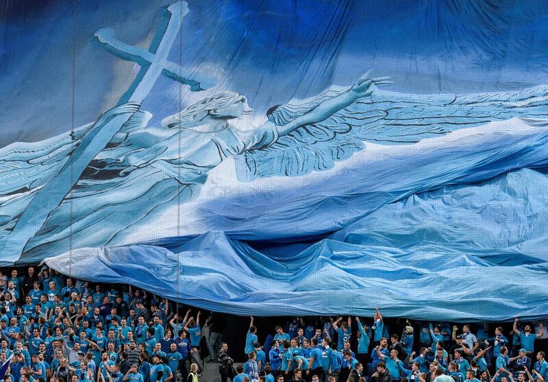 Zenit st Petersburg supporters hold a giant banner before their Uefa Champions League Group G match against Benfica at the Gazprom Arena on Wednesday, October 2. AFP