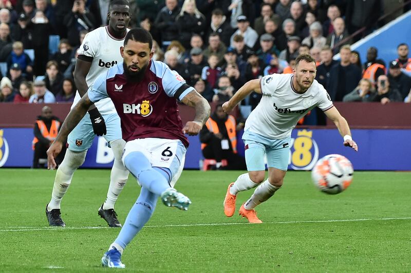 Aston Villa's Douglas Luiz scores his side's second goal from the penalty spot against West Ham United at Villa Park. AP