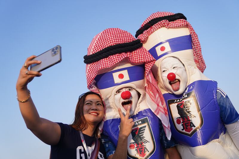 Japan supporters are sliding into the spirit of the World Cup in Qatar. AFP