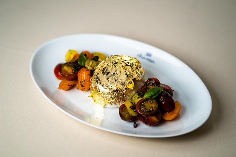 Tuck into a gold-coated burrata from Marea in DIFC, priced at Dh220. Supplied