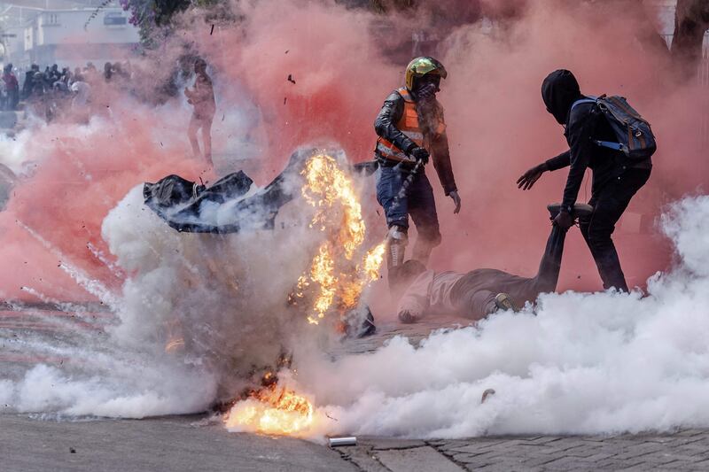 Police used tear gas and water cannon in an attempt to disperse the demonstrators. AFP