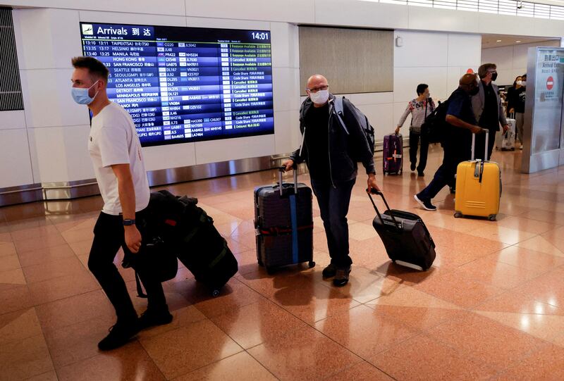 Foreign travellers arrive in Tokyo after Japan opened its doors to tourists after two-and-a-half years, owing to travel restrictions sparked by the Covid-19 outbreak. Reuters