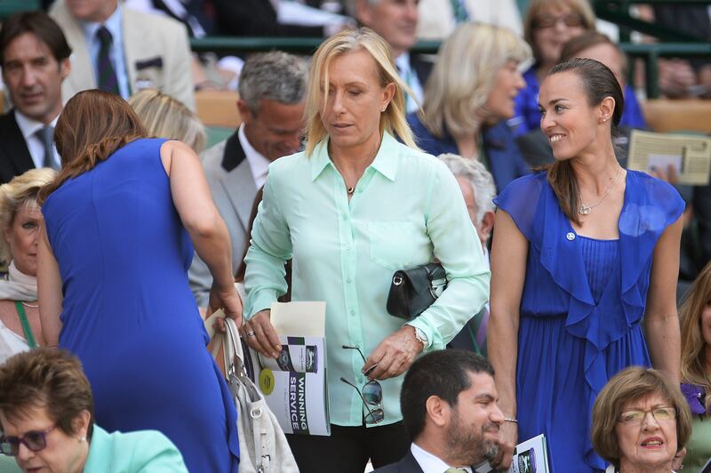 LONDON, ENGLAND - JULY 06:  Martina Navratilova and Martina Hingis arrive in the Royal Box on Centre Court for the Ladies' Singles final match between Sabine Lisicki of Germany and Marion Bartoli of France on day twelve of the Wimbledon Lawn Tennis Championships at the All England Lawn Tennis and Croquet Club on July 6, 2013 in London, England.  (Photo by Dennis Grombkowski/Getty Images) *** Local Caption ***  173066837.jpg