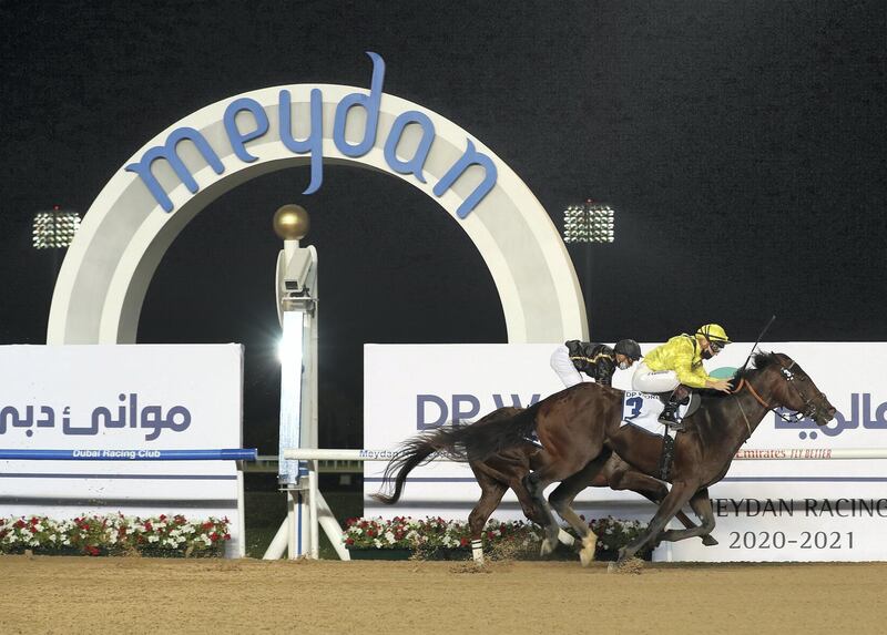 Dubai, United Arab Emirates - Reporter: Amith Passela. Sport. Horse Racing. Mouheeb ridden by Ryan Curatolo wins the UAE 2000 Guineas at the Dubai World Cup Carnival. Dubai. Thursday, February 4th, 2021. Chris Whiteoak / The National