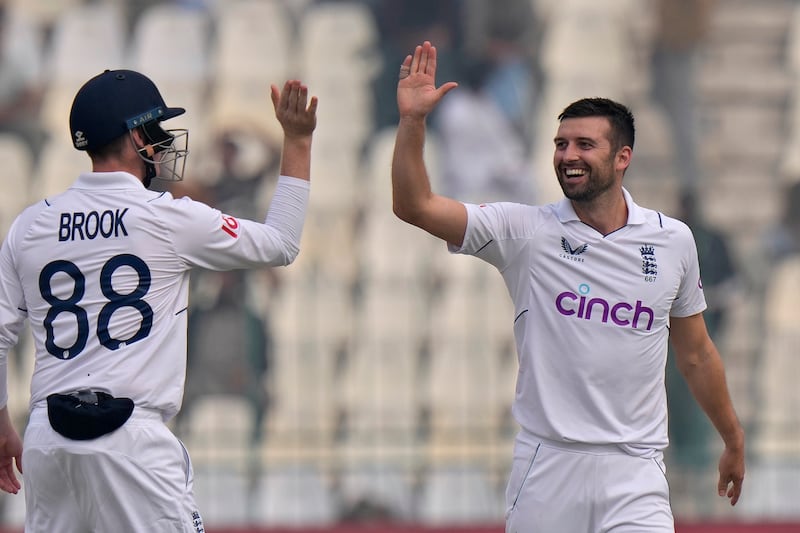 England bowler Mark Wood celebrates after taking the wicket of Pakistan's Zahid Mahmood for a duck. AP