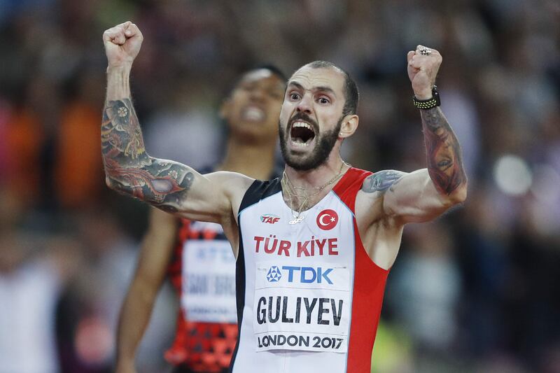 Turkey's Ramil Guliyev reacts as he wins the final of the men's 200m athletics event at the 2017 IAAF World Championships at the London Stadium in London on August 10, 2017. / AFP PHOTO / Adrian DENNIS