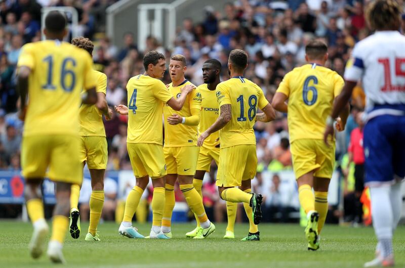 Chelsea players celebrate their first goal, scored by Barkley. PA Photo