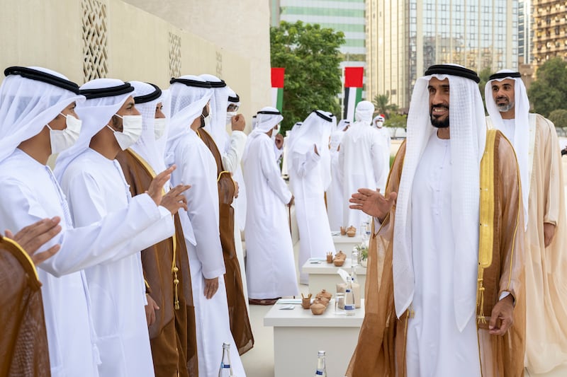 Sheikh Nahyan bin Zayed, chairman of the board of trustees of Zayed bin Sultan Al Nahyan Charitable and Humanitarian Foundation, and Sheikh Khaled bin Mohamed bin Zayed, member of the Abu Dhabi Executive Council and chairman of Abu Dhabi Executive Office, attend the group wedding reception.