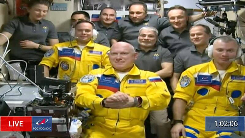 Russian cosmonauts Sergey Korsakov, Oleg Artemyev and Denis Matveyev arrive at the International Space Station on Friday, March 18, wearing yellow flight suits with blue stripes, the colours of the Ukrainian flag. AP