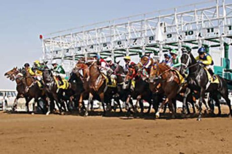 Horses set off on a race at Nad Al Sheba last year; the new season gets underway at this track tomorrow.