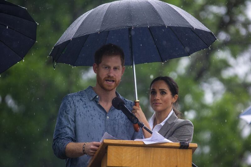 Prince Harry, Duke of Sussex and Meghan, Duchess of Sussex address the public during a Community Event at Victoria Park on October 17, 2018 in Dubbo, Australia. Getty Images