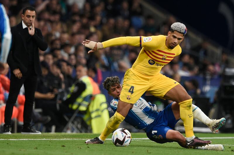 Barcelona defender Ronald Araujo vies with Espanyol's Nico Melamed. AFP